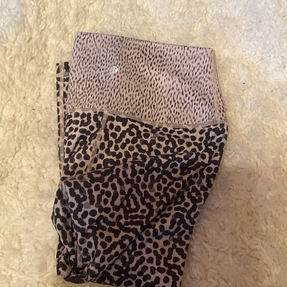Lululemon  tights in a fun animal print, Capri length.